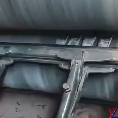 Double-sided polishing machine for stainless steel accessories.