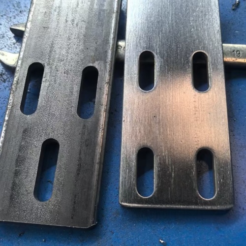 Steel Plate Grinding Solution: Custom 8-Head Machine for Slotted Plates
